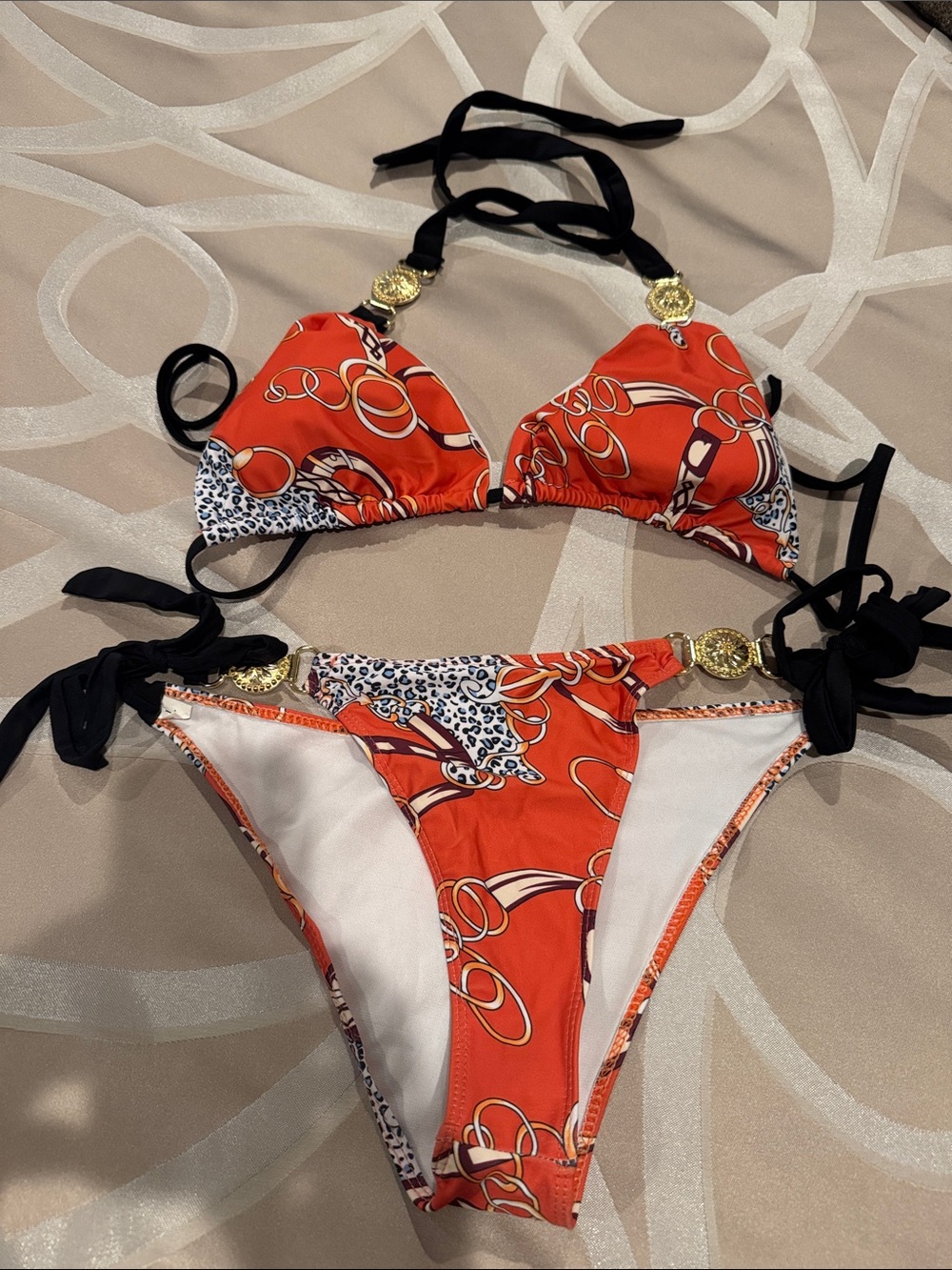 Women's Burnt Orange and Black Patterned Tie-Side Bikini with Gold Accents